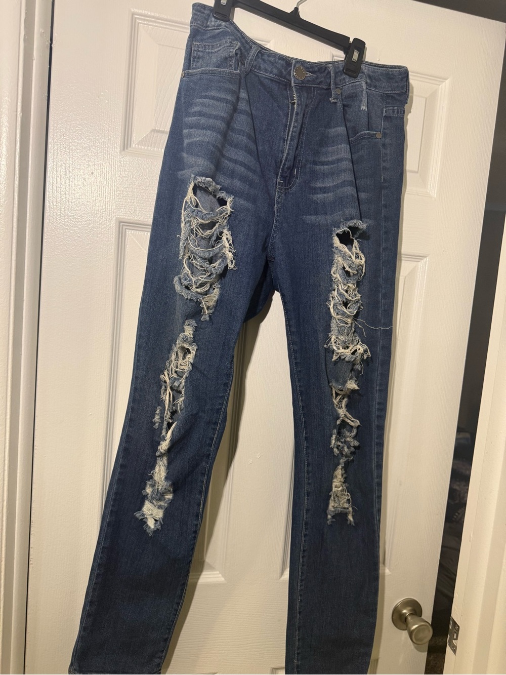 V.I.P. Jeans heavily distressed blue denim jeans, size 13/14.